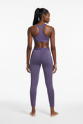 Mannequin africaine portant le legging Nike Pro violet - Vue de dos