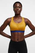 Mannequin femme avec brassière Nike jaune moutarde - Vue de face