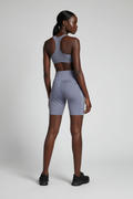 Mannequin femme avec short Nike Pro gris - Vue de dos